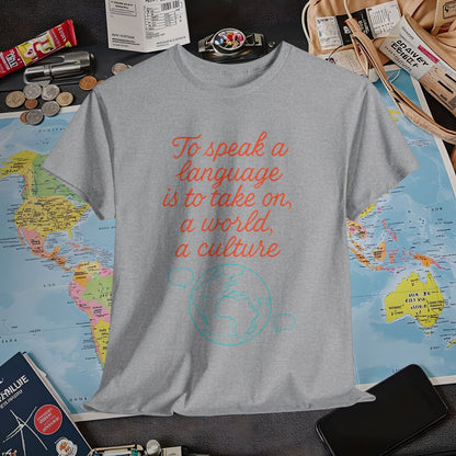 To Speak a Language Is to Take on a World – Cultural Connection Tee with Globe & Speech Bubbles | Layover Club Air Travel T-Shirts | Jetsetter, Airport, and International Flight Tees